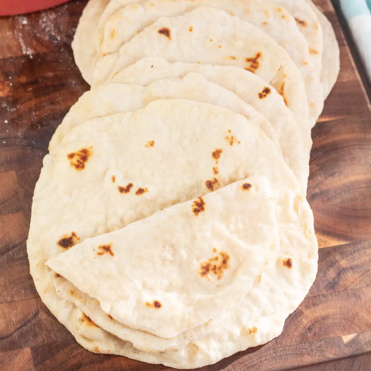 Soft homemade flour tortillas are made using the traditional ingredients lard, flour, salt, water and fried until golden.