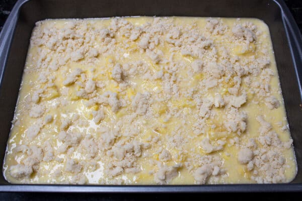 pineapple bars assembed with pastry crust, pineapple filling, and crumble topping