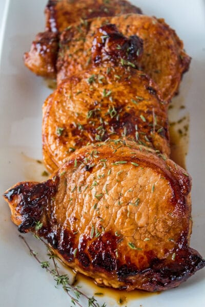 These fantastic flavored pan seared pork chops are super easy to make and cook up in no time for a great dinner even on busy nights!