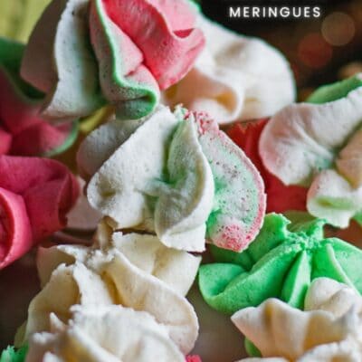 vertical pin with closeup of christmas cake batter meringues and text overlay.