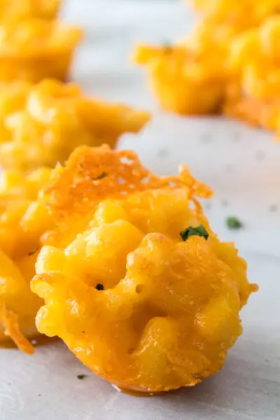 Amazingly tasty and fun to make homemade baked macaroni and cheese bites are perfect for using up leftover mac n cheese!