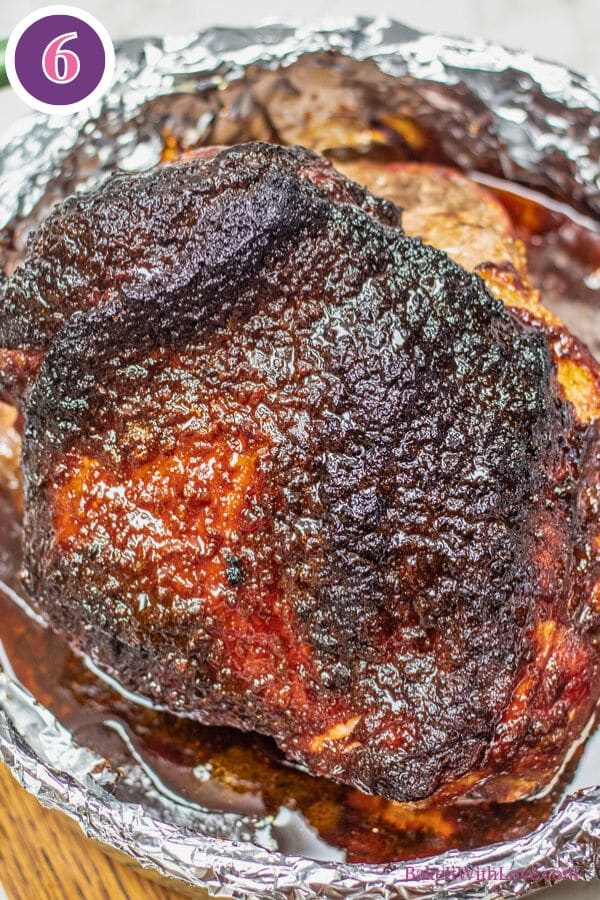 Brown sugar dijon pork roast process photo 6 showing the caramelized roasted pork roast once it is finished in the oven.