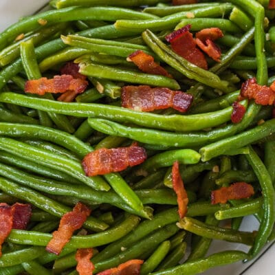 wide overhead closeup of garlic green beans with bacon.