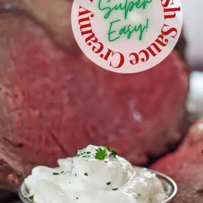 pin image of creamy horseradish sauce in metal bowl.