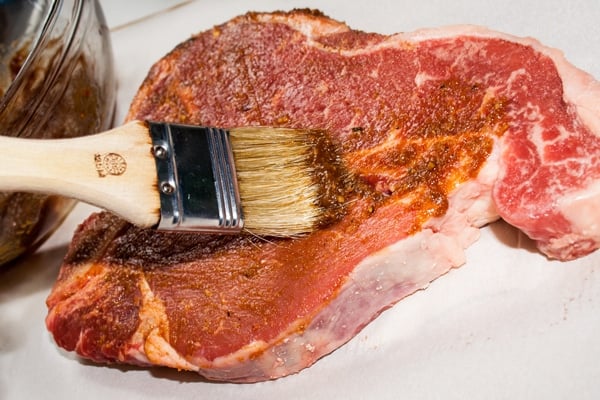 Coating the porterhouse steak in red miso sauce , www.bakeitwithlove.com