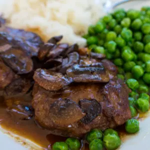 This Slow Cooker Salisbury Steak (with mushrooms and gravy) is so good it tastes just like the classic dish!