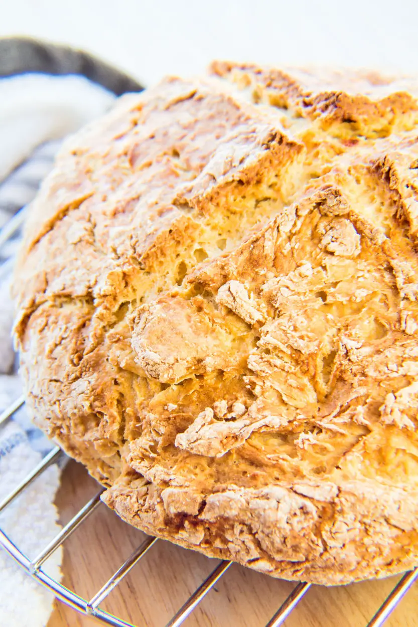 Traditional Irish Soda Bread round loaf baked perfectly and cooling.
