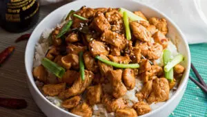 horizontal angled overhead image of instant pot mongolian chicken ready to enjoy.