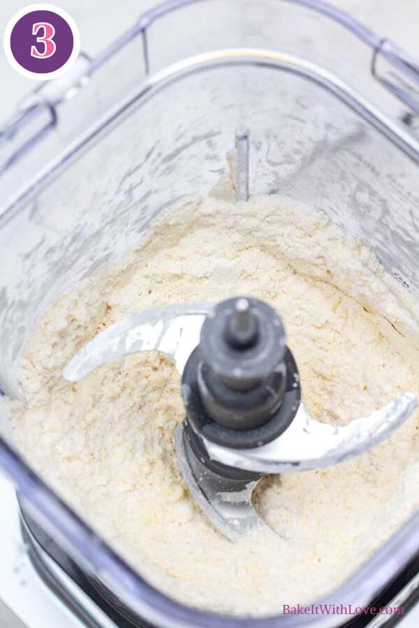 All butter pie crust process photo 3 showing the flour butter and salt combined in food processor.