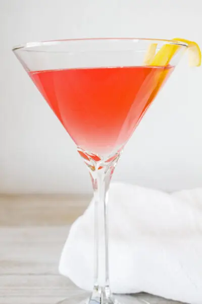 The Cosmopolitan is a delightfully fresh tasting adult version of pink lemonade that is a super easy 4 ingredient cocktail!