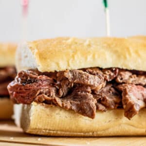 Best leftover prime rib french dip sandwich on fresh cut baguette with tender chunks of sliced prime rib beef and jus.