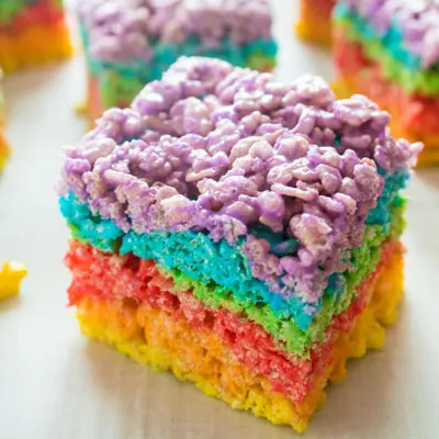 Fantastic, fun, and colorful Rainbow Rice Krispies Treats are an easy no-bake treat for all occasions! at www.bakeitwithlove.com