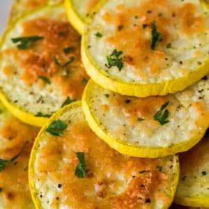 Simply delicious, golden baked Parmesan coated yellow squash rounds are the perfect anytime snack or side dish!!
