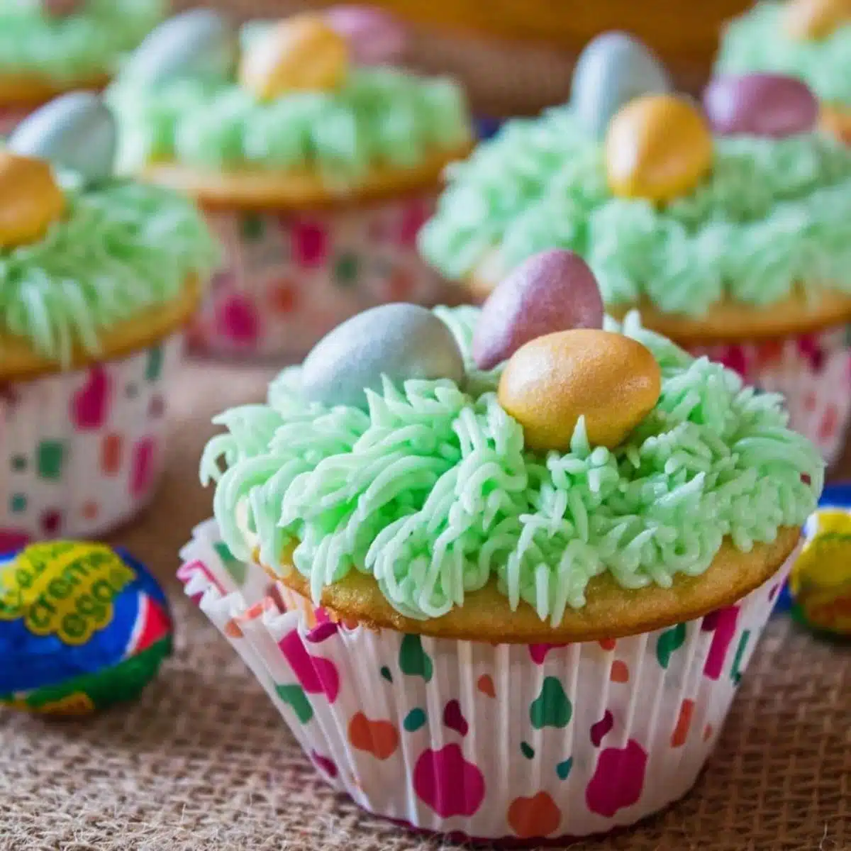 Square image of Easter basket cupcakes.