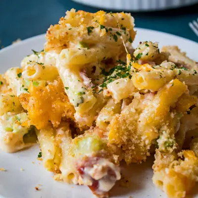 This easy leftover ham casserole with broccoli and cheese is made with 3 cheeses, ziti, and topped with breadcrumbs for an amazing meal from your ham!