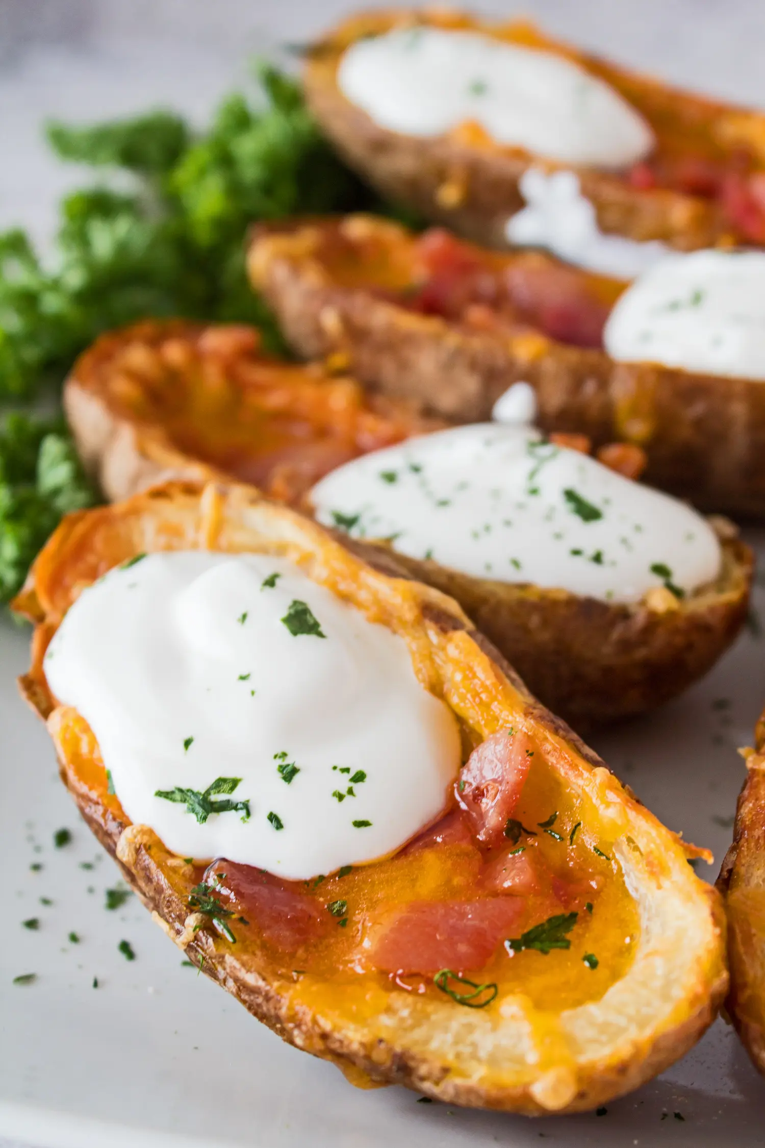These fantastic, super crispy Air Fryer Potato Skins are a wonderful snack or appetizer!