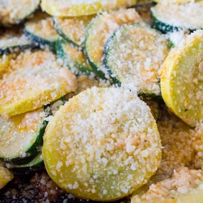 This quick and easy sauteed zucchini and yellow squash recipe is easy to make and perfect with some garlic and Parmesan cheese!