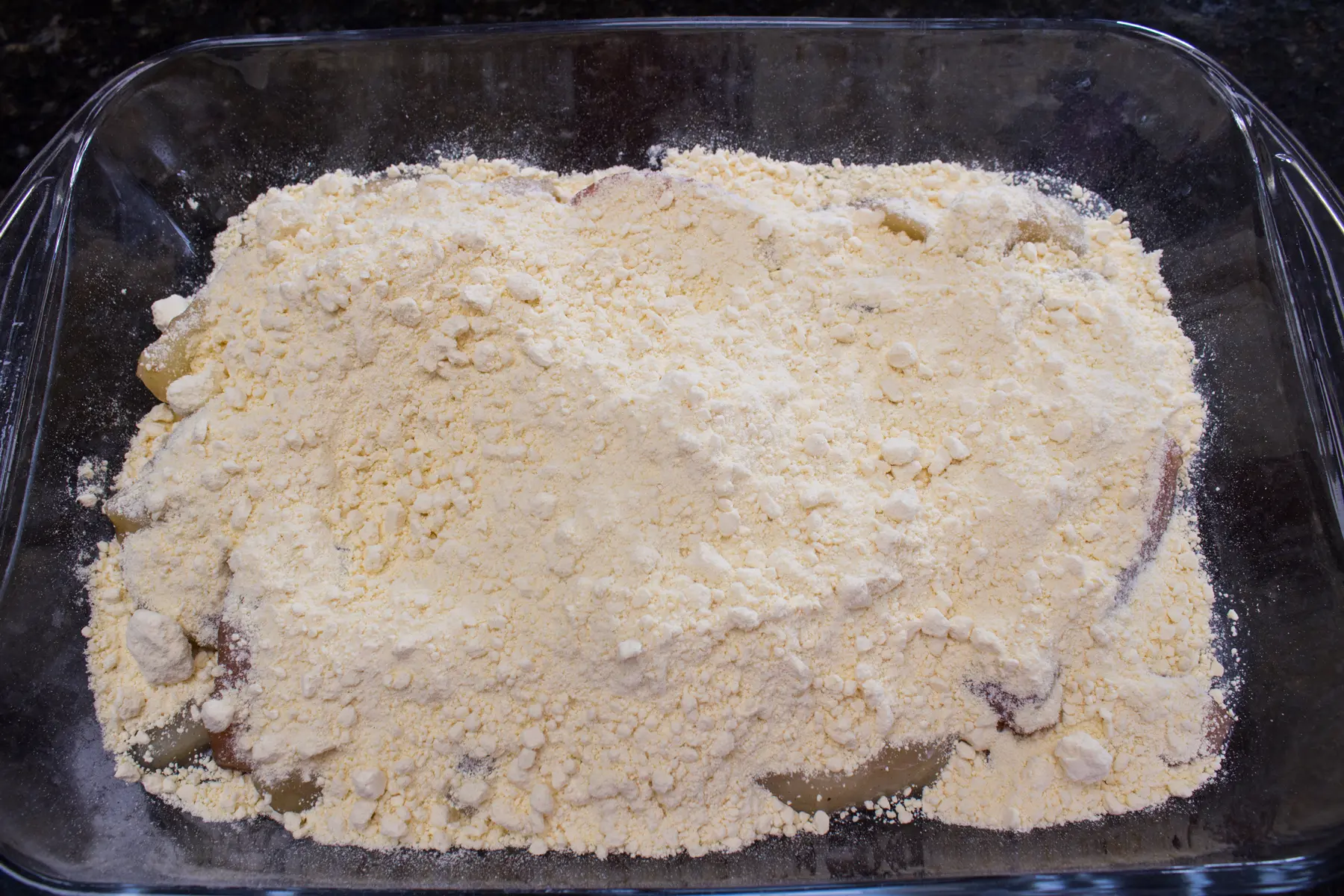 the second layer in this amazingly tasty apple dump cake is a box of cake mix, i prefer yellow cake mix