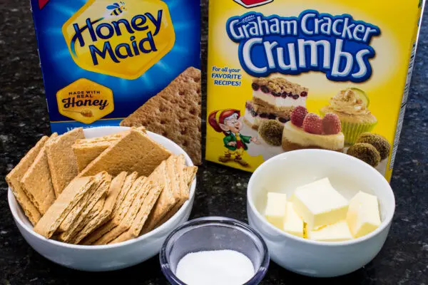 graham cracker crust ingredients with options for using whole graham crackers or packaged graham cracker crumbs, white sugar and butter