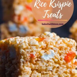 pin with tall closeup image of the candy corn rice krispie treats.