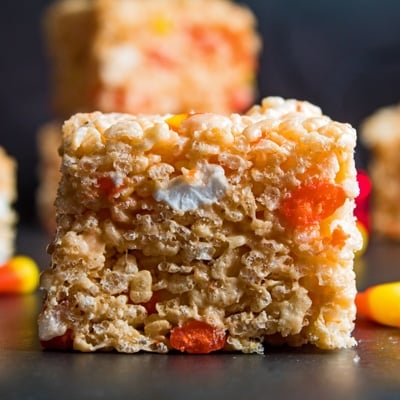 small square straight on image of a cut candy corn rice krispie treat.
