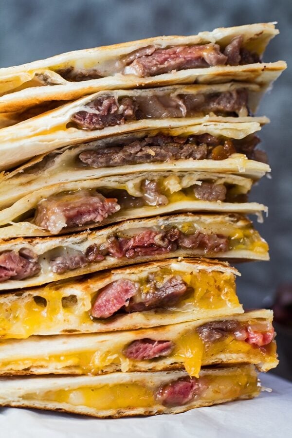 tall image of stacked leftover prime rib quesadillas.