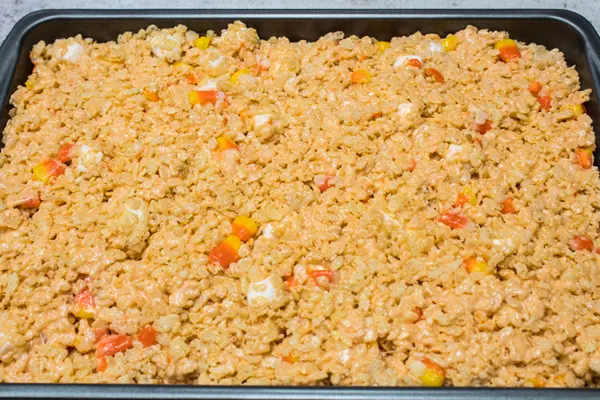 candy corn rice krispie treats setting in 9 x 13 pan.