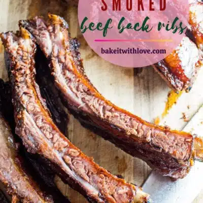 pin overhead image of smoked beef back ribs with text overlay.