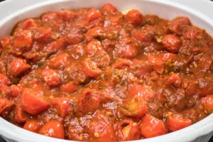 the second layer in Italian sausage bake is spaghetti sauce.