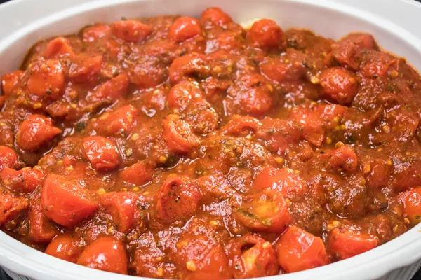 the second layer in Italian sausage bake is spaghetti sauce.