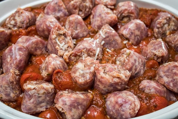 the third layer in italian sausage and pasta bake is chunked pieces of italian sausage links.
