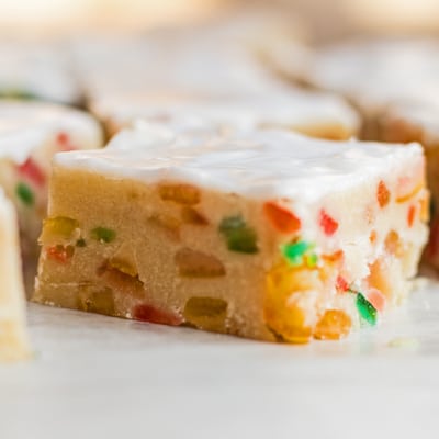 small square closeup image of fruitcake shortbread squares after slicing.