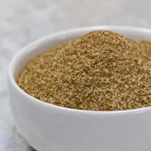 Celery salt shown in white bowl.