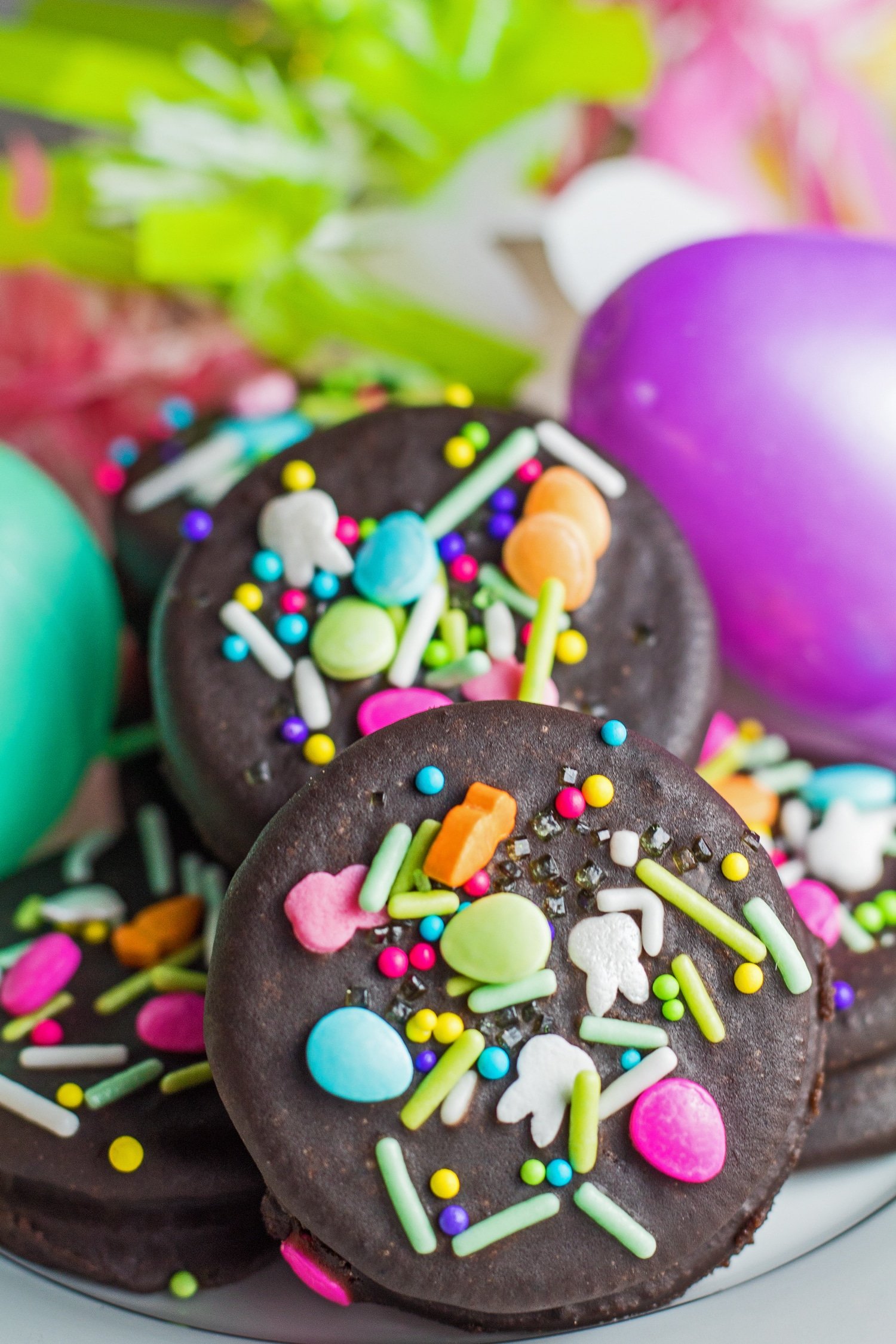 Tall image of the Easter Fudge Covered Oreos with decorative eggs.