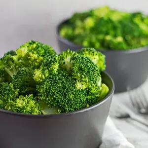 Perfectly cooked steamed broccoli served after cooking in the microwave.