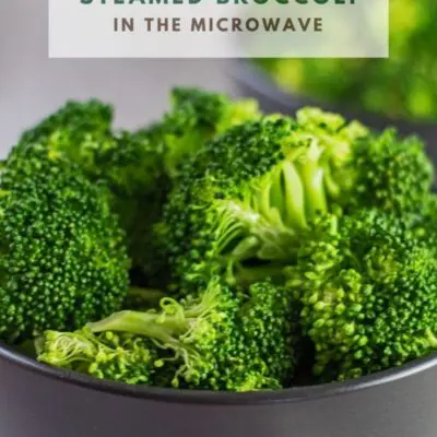 Pin with microwave steamed broccoli and text overlay.