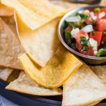 Air fryer tortilla chips served with pico de gallo and salsa verde.Air fryer tortilla chips served with pico de gallo and salsa verde.