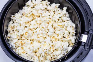 Air fryer popped popcorn to transfer to your bowl.