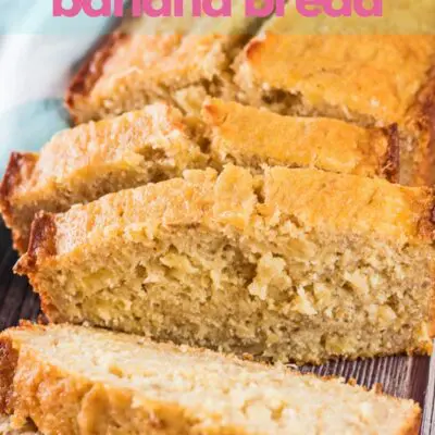Pin with pineapple banana bread sliced and ready to serve.