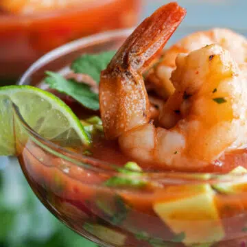 Coctel de Camarones Mexican shrimp cocktail served in margarita glasses.