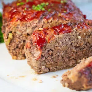 Quick and easy stove top meatloaf sliced and served on platter.