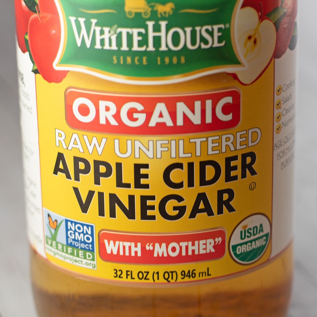 Image de substitut de vinaigre de cidre de pomme montrant l'acv en bouteille.