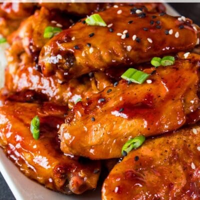 General Tso's chicken wings pin with text header.
