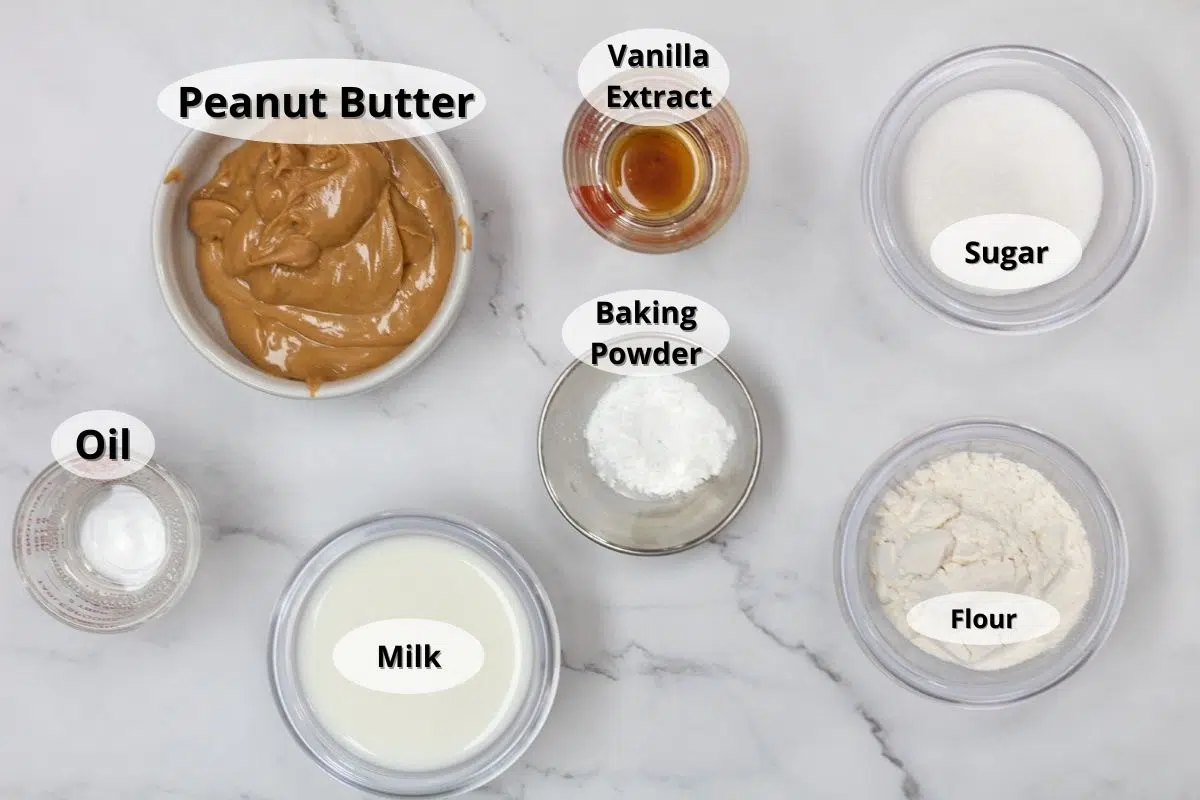 Peanut butter mug cake ingredients with labels.
