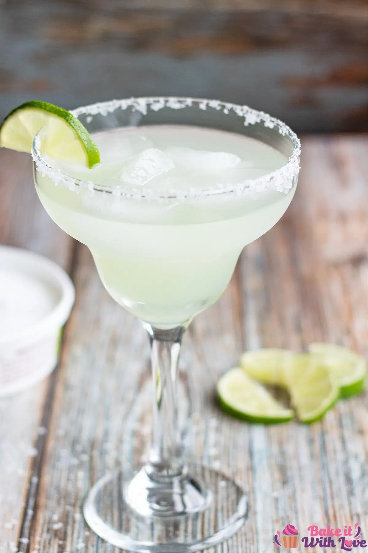Tall image of the vodka margarita garnished with lime.