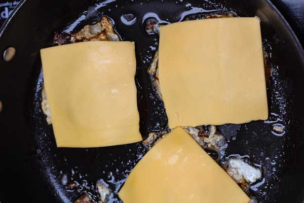 Process photo 3 with the cheese added to melt over eggs.