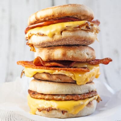 Breakfast sandwich variety with 3 sandwiches stacked.