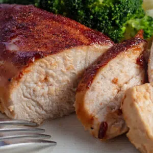 Closeup on the sliced baked bbq chicken breast.