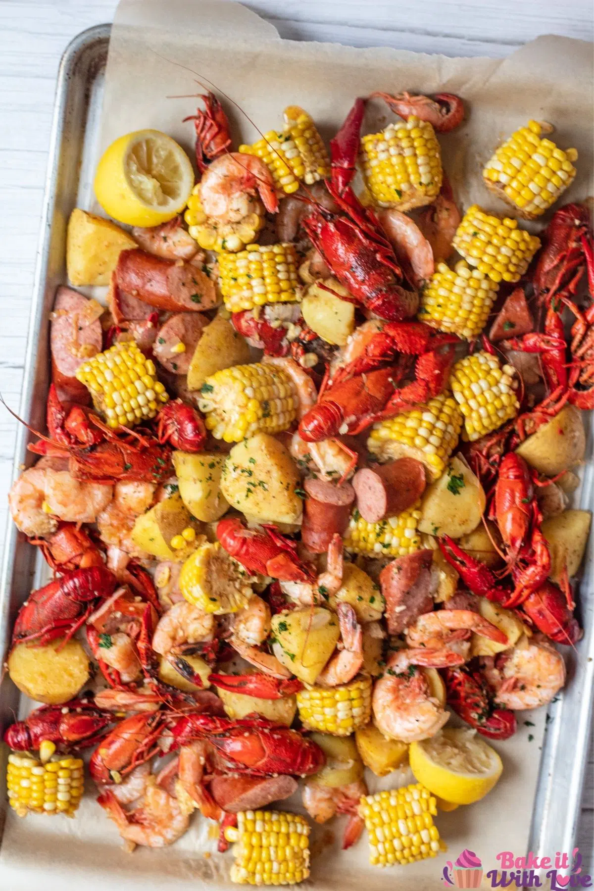 Tall overhead image of the cooked Cajun seafood boil.