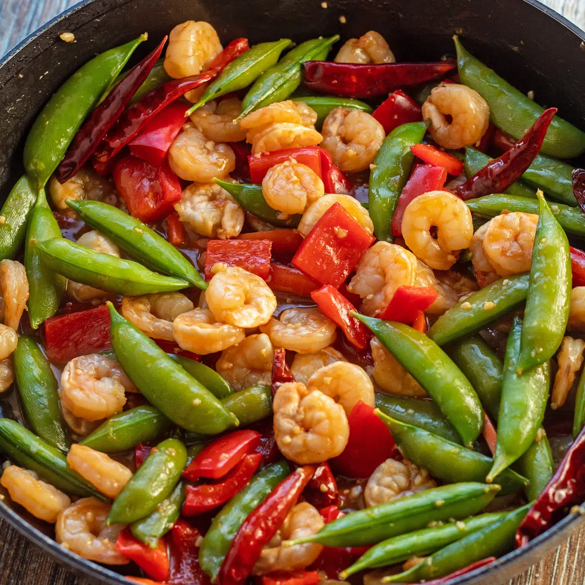 Shrimp with garlic sauce in pan.